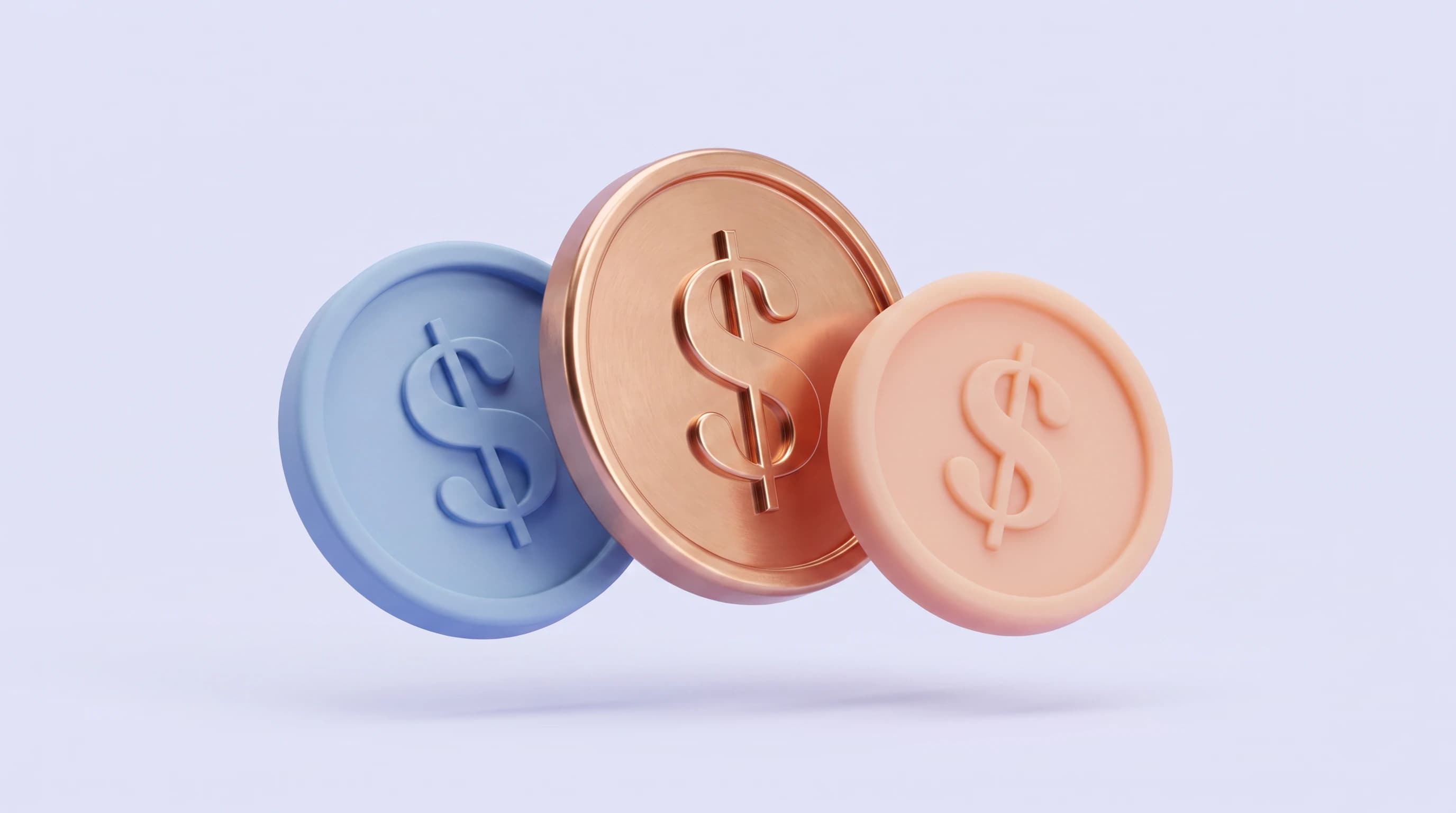 Three rounded coins of slightly different sizes fanned side by side, each embossed with a dollar relief, the tallest coin tilting forward in a calm triangular grouping